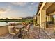 Elegant outdoor patio with dining, golf course and mountain views, perfect for Arizona outdoor living at 3086 S First Water Ln, Gold Canyon, AZ 85118