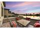 Relaxing patio with outdoor dining, golf course view and spa for enjoying the Arizona sunsets at 3086 S First Water Ln, Gold Canyon, AZ 85118