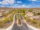 Expansive aerial view of Primary-planned community with beautiful landscaping and Sonoran Desert scenery in background at 31020 N 5Th St, Phoenix, AZ 85085