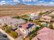Charming aerial view captures a well-maintained residential neighborhood with solar panels atop a home's red tile roof at 31020 N 5Th St, Phoenix, AZ 85085