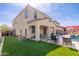 Entertain in this home's backyard with artificial turf, sparkling pool and built in basketball court for friendly competition at 31020 N 5Th St, Phoenix, AZ 85085