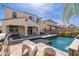 An inviting backyard pool features a sleek design and comfortable patio furniture for relaxation and entertainment at 31020 N 5Th St, Phoenix, AZ 85085