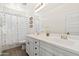 Well-lit bathroom with double sinks, stylish fixtures, and shower-tub combo at 31020 N 5Th St, Phoenix, AZ 85085