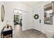 The entryway showcases a clean design with a view to the office, enhancing the home's modern aesthetic at 31020 N 5Th St, Phoenix, AZ 85085