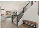 The foyer features a staircase and bench, complemented by tile flooring and views of the backyard and pool at 31020 N 5Th St, Phoenix, AZ 85085