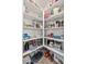 Walk-in pantry with organized shelving, offering ample storage space for food and household items at 31020 N 5Th St, Phoenix, AZ 85085