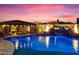 Inviting backyard pool and outdoor living area with covered seating and water feature at 32020 N 20Th Dr, Phoenix, AZ 85085