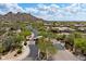 Picturesque aerial view of the community, showcasing luxurious homes and lush desert landscaping at 33269 N 73Rd Pl, Scottsdale, AZ 85266