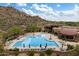 Well-maintained community pool with multiple seating areas offers a perfect space for relaxation at 33269 N 73Rd Pl, Scottsdale, AZ 85266