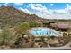 Aerial view of the community pool and desert landscaping provides a tranquil and inviting atmosphere at 33269 N 73Rd Pl, Scottsdale, AZ 85266