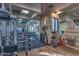 Bright fitness center offering free weights, weight machines, a mirror wall, and a drinking fountain at 33269 N 73Rd Pl, Scottsdale, AZ 85266