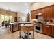 Bright kitchen with large island, stainless appliances, and attached dining area at 33269 N 73Rd Pl, Scottsdale, AZ 85266