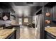 Modern kitchen featuring stainless steel appliances and granite countertops at 3516 W Brown St, Phoenix, AZ 85051