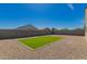 Backyard showcasing a small grassy patch and gravel at 3597 E Appaloosa Dr, San Tan Valley, AZ 85140