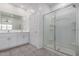Modern bathroom featuring a double sink vanity and glass-enclosed shower for a spa-like experience at 3597 E Appaloosa Dr, San Tan Valley, AZ 85140