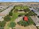 Community aerial view featuring neighborhood park, green spaces, and mountain views at 36939 W Santa Maria St, Maricopa, AZ 85138