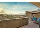 Balcony offers bench swing and lush desert views at 38199 N Tranquil Way, Carefree, AZ 85377