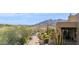 Front exterior with desert landscaping and a mountain view at 38199 N Tranquil Way, Carefree, AZ 85377