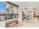Bright living room with desert views from the large picture window and open concept design at 38199 N Tranquil Way, Carefree, AZ 85377