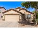 Charming single-Gathering home featuring a two-car garage and low-maintenance landscaping at 4076 E Silverbell Rd, San Tan Valley, AZ 85143