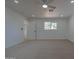 Spacious bedroom boasts neutral carpet, a ceiling fan, recessed lighting, and great natural light at 4109 N 30Th Ave, Phoenix, AZ 85017