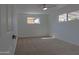 Bedroom with carpet, neutral paint, two windows that allow ample natural light at 4109 N 30Th Ave, Phoenix, AZ 85017