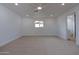 Spacious bedroom boasts neutral carpet, a ceiling fan, recessed lighting, and great natural light at 4109 N 30Th Ave, Phoenix, AZ 85017