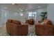Comfortable living room with ample seating, neutral walls, and an inviting atmosphere for relaxation at 4109 N 30Th Ave, Phoenix, AZ 85017