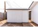 White shed with a dark roof, offering additional storage space on the property at 4109 N 30Th Ave, Phoenix, AZ 85017