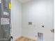 Spacious utility room with connections for laundry and a modern water heater at 4109 N 30Th Ave, Phoenix, AZ 85017