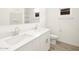 Bright bathroom featuring a double vanity with white cabinets and a tiled floor at 4364 W Hannah St, San Tan Valley, AZ 85144