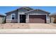 Charming single-story home featuring a two-car garage, neutral stucco, and low-maintenance landscaping at 4364 W Hannah St, San Tan Valley, AZ 85144