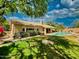 Lush backyard with in-ground pool at 4867 E Windstone Trl, Cave Creek, AZ 85331