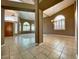 Spacious living room with tiled floors, high ceilings, and ample light at 4867 E Windstone Trl, Cave Creek, AZ 85331