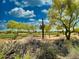 Desert landscape and golf course view beyond at 4867 E Windstone Trl, Cave Creek, AZ 85331