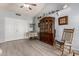 Spacious living room showcasing vaulted ceiling, neutral paint, and luxury vinyl plank flooring at 5221 W Garden Dr, Glendale, AZ 85304