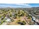 Stunning aerial view of a community near a golf course with beautiful mountain views on a sunny day at 544 W Thunderbird Rd, Phoenix, AZ 85023