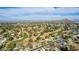 Expansive aerial shot showcasing a golf course community under a clear sky, complete with lush greenery at 544 W Thunderbird Rd, Phoenix, AZ 85023