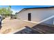 Spacious backyard featuring a covered patio area with a detached garage with a private door at 544 W Thunderbird Rd, Phoenix, AZ 85023