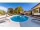 Sparkling swimming pool with an inviting patio and lush landscaping at 544 W Thunderbird Rd, Phoenix, AZ 85023