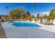 Inviting swimming pool surrounded by lounge chairs, set against a clear blue sky at 544 W Thunderbird Rd, Phoenix, AZ 85023