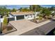 Charming single-story home with a well-kept front yard and a two-car garage at 544 W Thunderbird Rd, Phoenix, AZ 85023