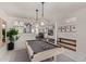 Well-lit game room with a pool table and open layout to the dining area at 544 W Thunderbird Rd, Phoenix, AZ 85023