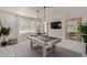 Game room featuring a pool table, large mirror, and stylish lighting at 544 W Thunderbird Rd, Phoenix, AZ 85023