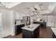 Open kitchen with island sink, modern appliances, and ample countertop space at 544 W Thunderbird Rd, Phoenix, AZ 85023