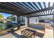 Outdoor seating area with a pergola, perfect for relaxing and enjoying the weather at 544 W Thunderbird Rd, Phoenix, AZ 85023