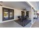 Covered outdoor patio area with a table and chairs, perfect for entertaining guests at 544 W Thunderbird Rd, Phoenix, AZ 85023