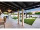 Inviting backyard patio featuring a gazebo, a barbecue area, and artificial grass at 5975 E Larkspur Dr, Scottsdale, AZ 85254