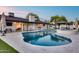 This amazing backyard features a swimming pool, manicured landscaping and a covered lounge area at 5975 E Larkspur Dr, Scottsdale, AZ 85254