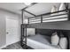 Unique gray bunkbeds with comfy mattresses and a built-in ladder at 5975 E Larkspur Dr, Scottsdale, AZ 85254
